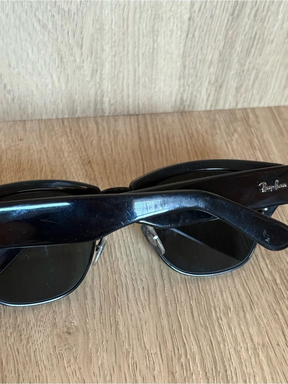 Ray-Ban Black Frame Sunglasses with Dark Lenses